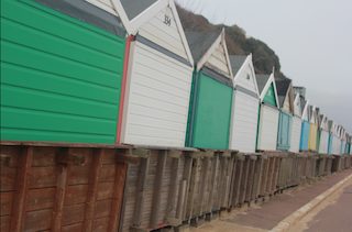 In December 2013 beach huts were smashed over cliff after being hit by slab of concrete that was believed to have dislodged from cliff after heavy rainfall from storms.