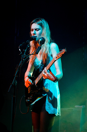Photo credit to Flickr user Paul Hudson. https://www.flickr.com/photos/pahudson/16916593190 Ellie Rowsell for Wolf Alice
