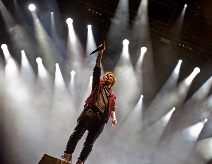 Ed Sheeran performing on stage