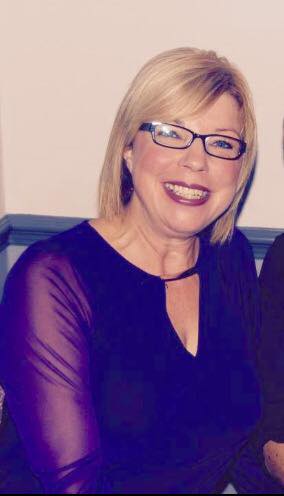 Picture of Emma Smith, a lady who is a regular volunteer at a homeless shelter