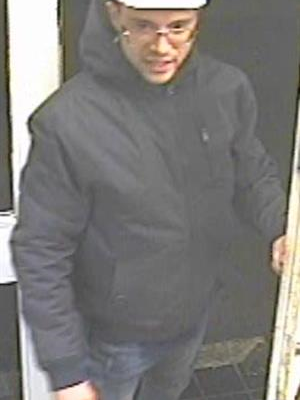 McColls robbery: CCTV image of suspect. Credit: Dorset Police