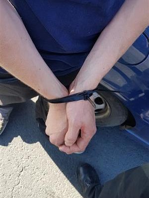 Dorset Police photo of man caught driving with his hands cable tied together. Issued by Dorset Police on 17 January 2019
