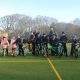 A photo of the school children on their bikes with Darryl Walsh the headteacher