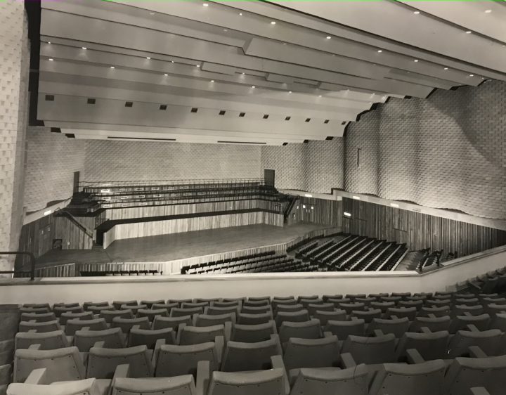 Photo of the Wessex Hall inside Poole Arts Centre, a large theatre for orchestra performances.