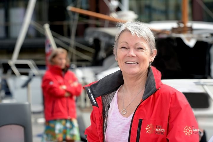 A woman in a red jacket 