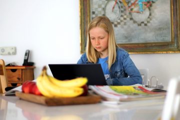 Girl looking at laptop