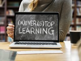 A photo of a screen saying never stop learning
