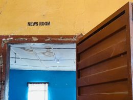 Open door into newsroom