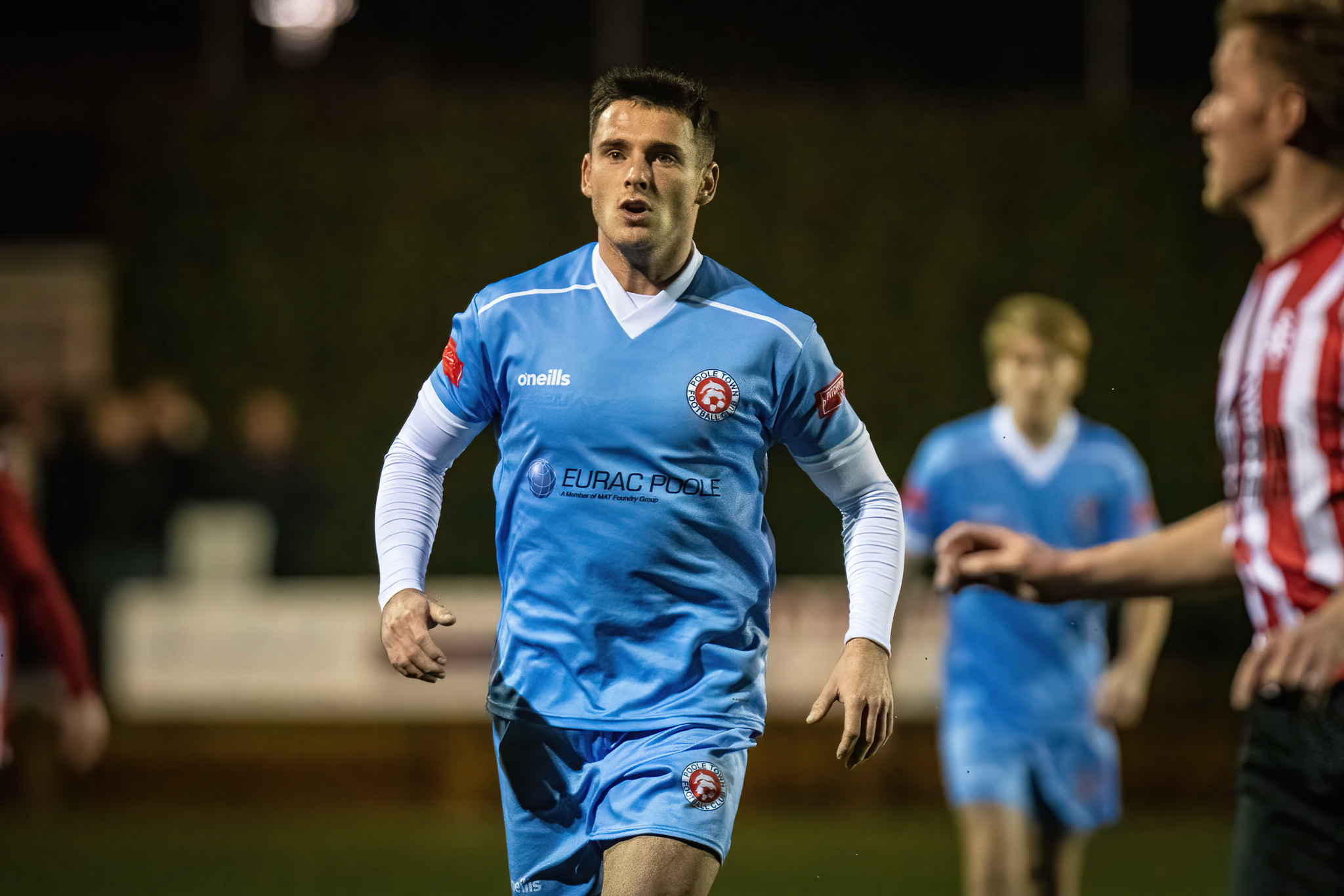 Poole Town's Will Fletcher in action against Shaftesbury