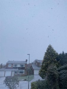 Snow in Dorchester from outside a house. 