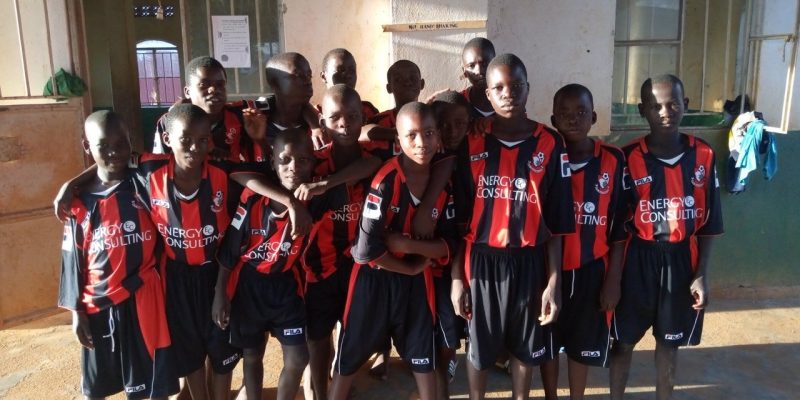 Ugandan Cherries in AFC Bournemouth Kits in Jinja.