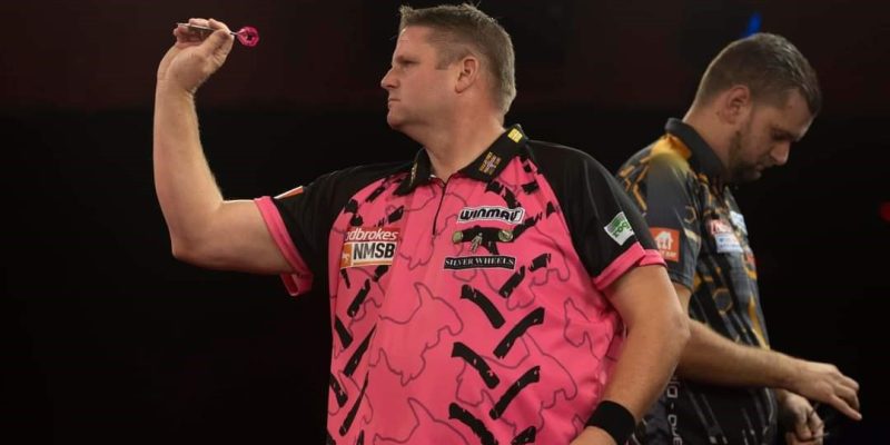 Scott Mitchell throwing a dart at the 2021 Ladbrokes Players Championship Finals.