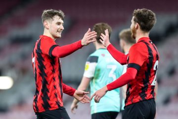 Photo of David Brooks celebrating during AFC Bournemouth's victory over Portsmouth.