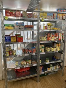 Stock shelf with canned food