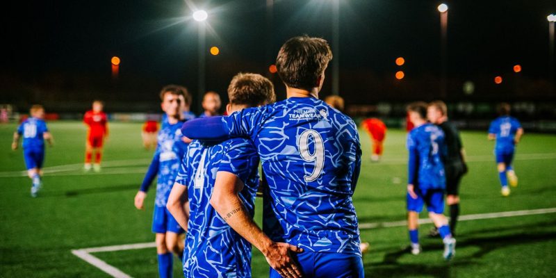 Stoneham's number nine and number four celebrating a goal.