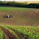 photo of drone over green field