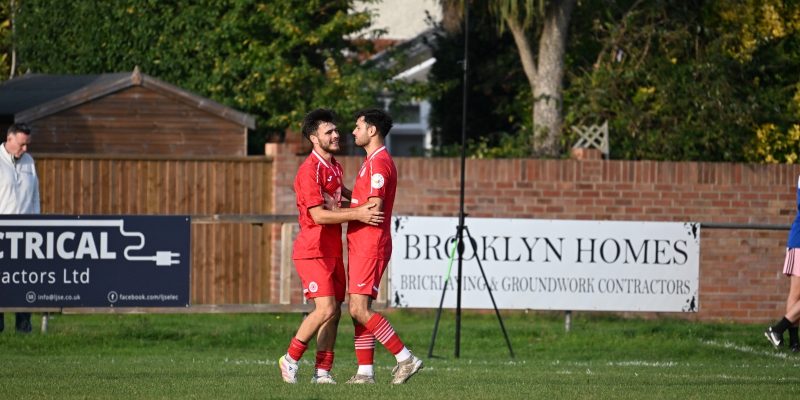 Lewis Brown celebrating with John Zdrava