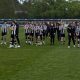 Wimborne Town club clapping after game.