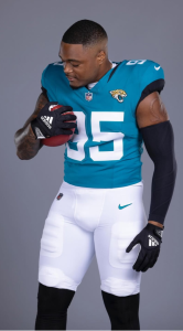 B.J.Green photo holding a pigskin ball.