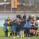 The AFC Bournemouth women in a huddle after their game.