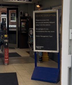 Photo of a sign by Bournemouth train station for the severe disruption