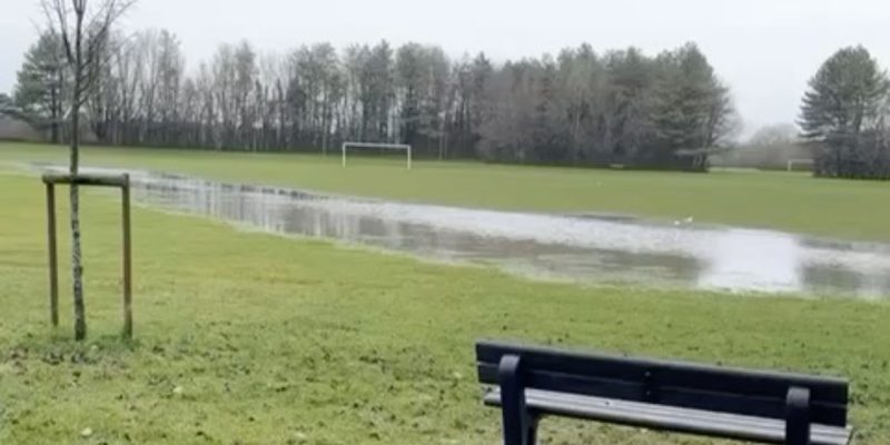 A waterlogged football pitch.