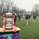 AFC Bournemouth women warming up next to the WFA Cup trophy.