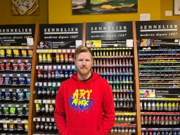 man in stationary shop