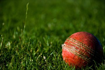 Cricket ball lying on the pitch
