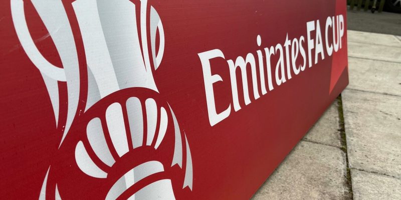 Picture of an FA Cup advertising board.