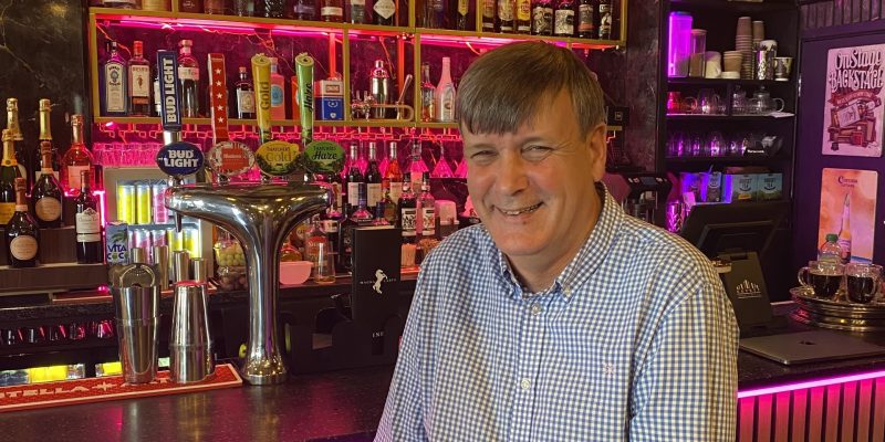 Paul Bennett, sitting at the bar